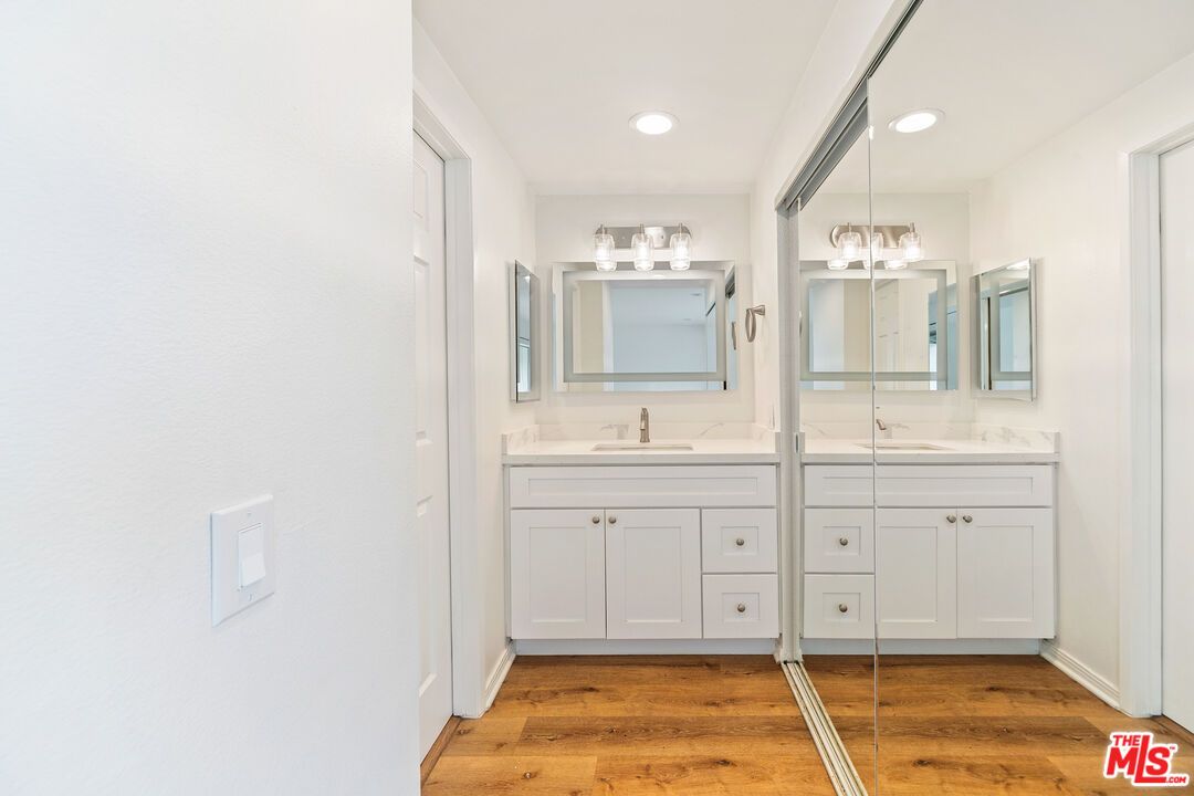 Bathroom, Dual Sink Vanities, Interior, Recessed Lighting, Wood Texture Flooring