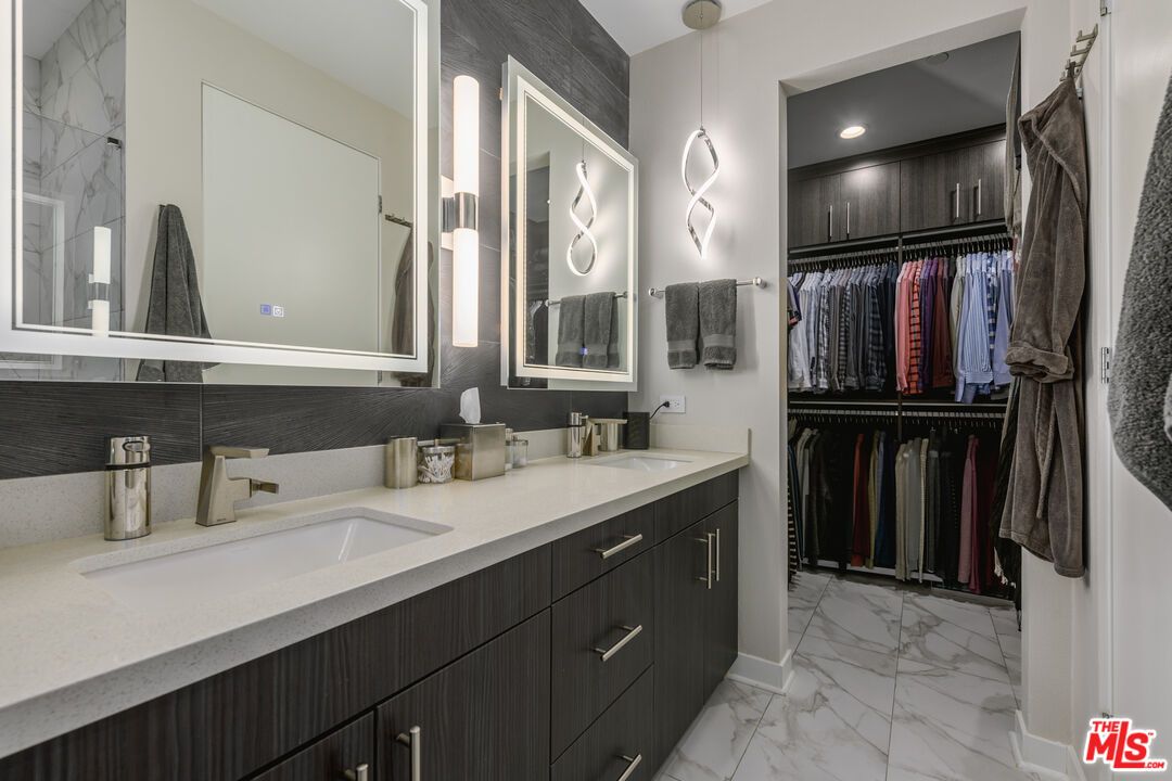 Bathroom, Dual Sink Vanities, Interior, Marble, Pendant Lights, Recessed Lighting, Walk-in Closets