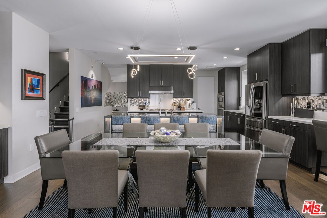 Dining room, Interior, Kitchen, Pendant Lights, Recessed Lighting, Stainless Steel Appliances, Wood Texture Flooring