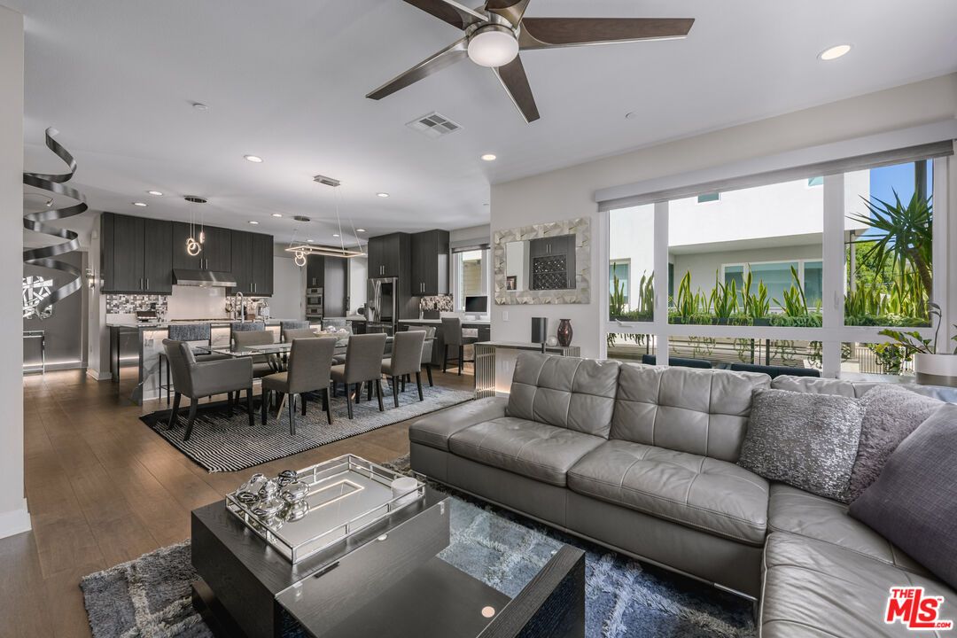 Dining room, Interior, Kitchen, Living room, Pendant Lights, Recessed Lighting, Stainless Steel Appliances, Wood Texture Flooring