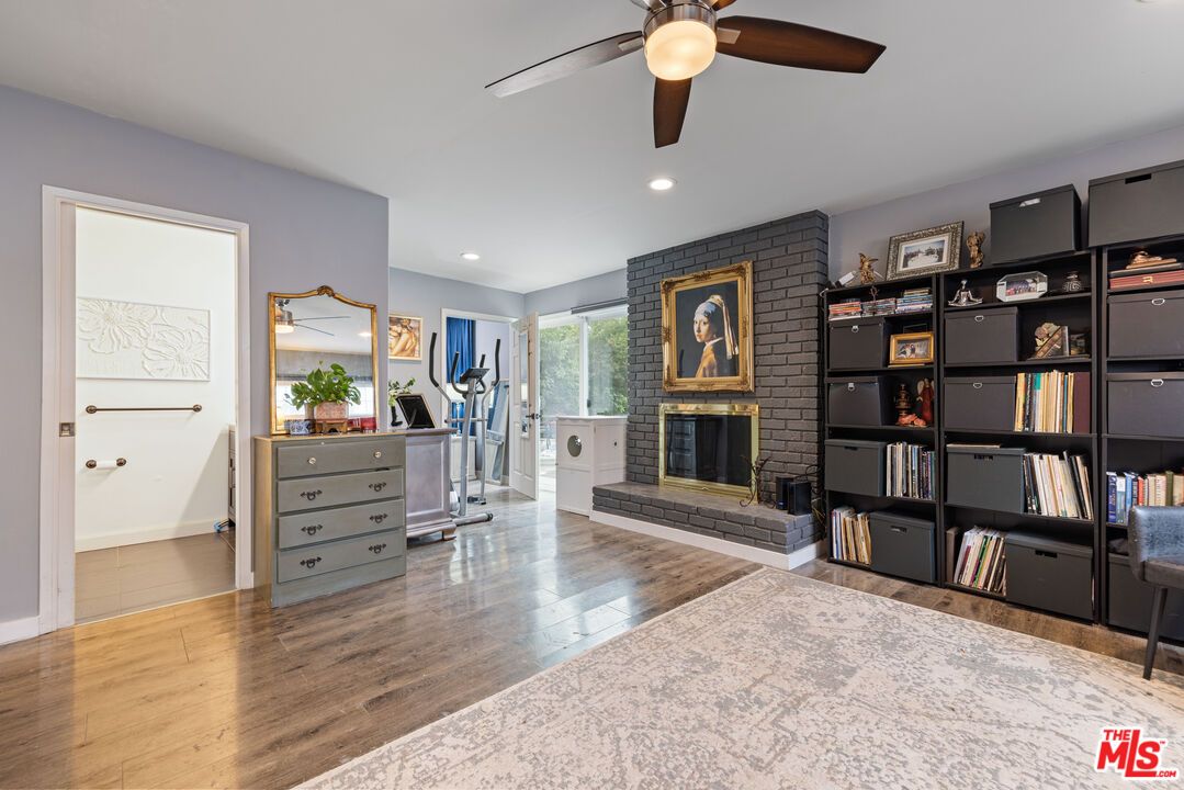 Fireplace, Interior, Recessed Lighting, Stone Walls, Wood Texture Flooring