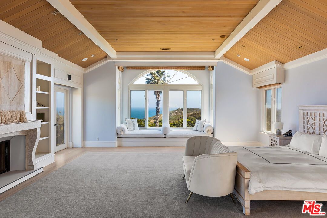 Bedroom, Fireplace, Interior, Recessed Lighting, Water, Wooden Ceilings