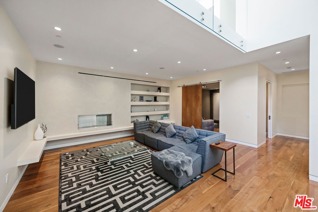 Fireplace, Interior, Living room, Recessed Lighting, Wood Texture Flooring