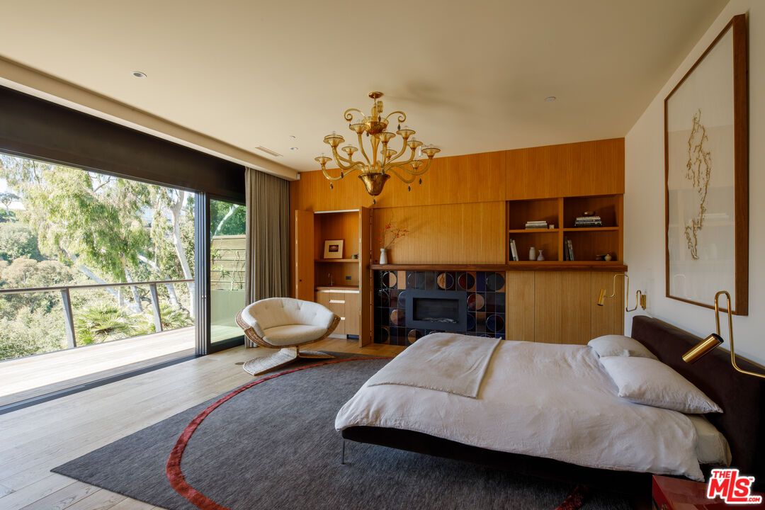 Bedroom, Chandelier, Fireplace, Interior, Recessed Lighting, Wood Texture Flooring