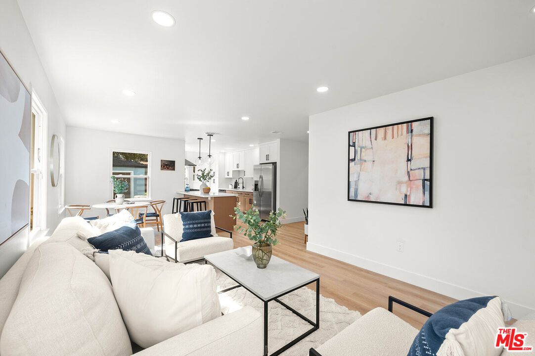 Dining room, Interior, Kitchen, Living room, Pendant Lights, Recessed Lighting, Stainless Steel Appliances, Wood Texture Flooring