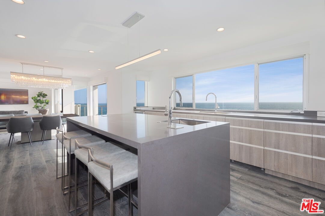 Chandelier, Dining room, Interior, Kitchen, Pendant Lights, Recessed Lighting, Water, Wood Texture Flooring