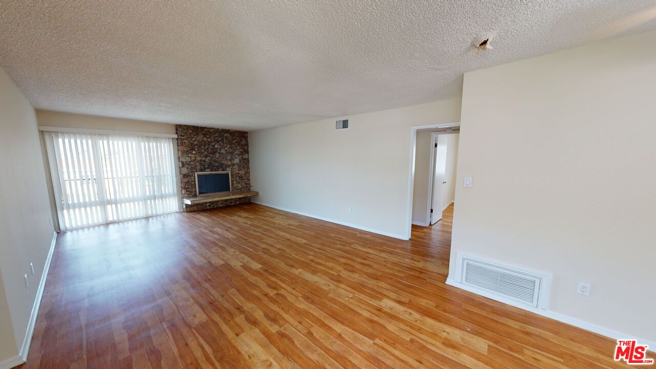 Empty room, Fireplace, Interior, Stone Walls, Wood Texture Flooring
