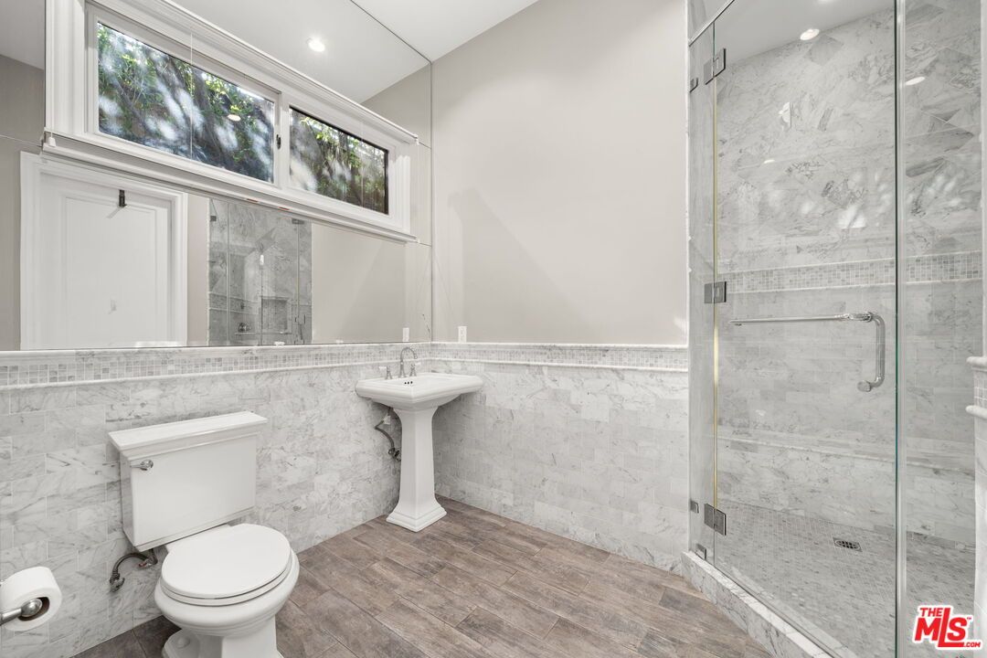 Bathroom, Glass Shower, Interior, Marble Walls, Recessed Lighting, Wood Texture Flooring