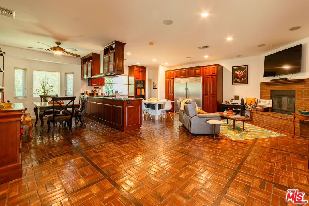 Dining room, Fireplace, Interior, Kitchen, Living room, Recessed Lighting, Stainless Steel Appliances, Stone Walls