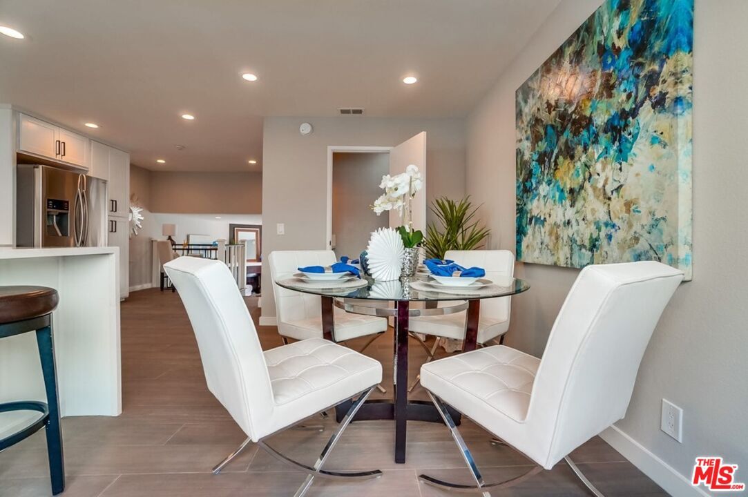 Dining room, Interior, Kitchen, Recessed Lighting, Stainless Steel Appliances, Wood Texture Flooring