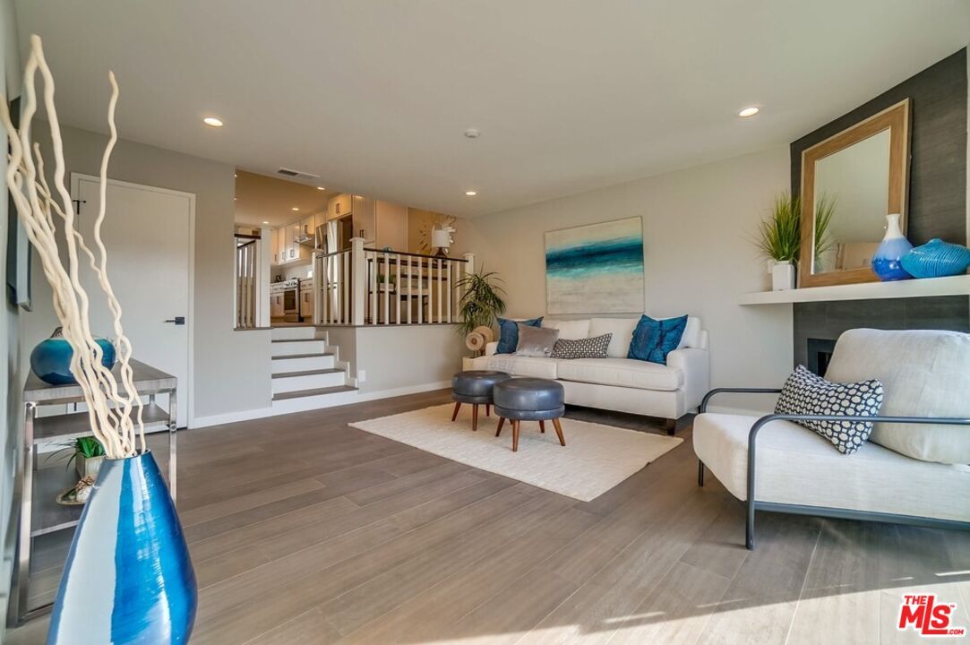 Fireplace, Interior, Living room, Recessed Lighting, Wood Texture Flooring