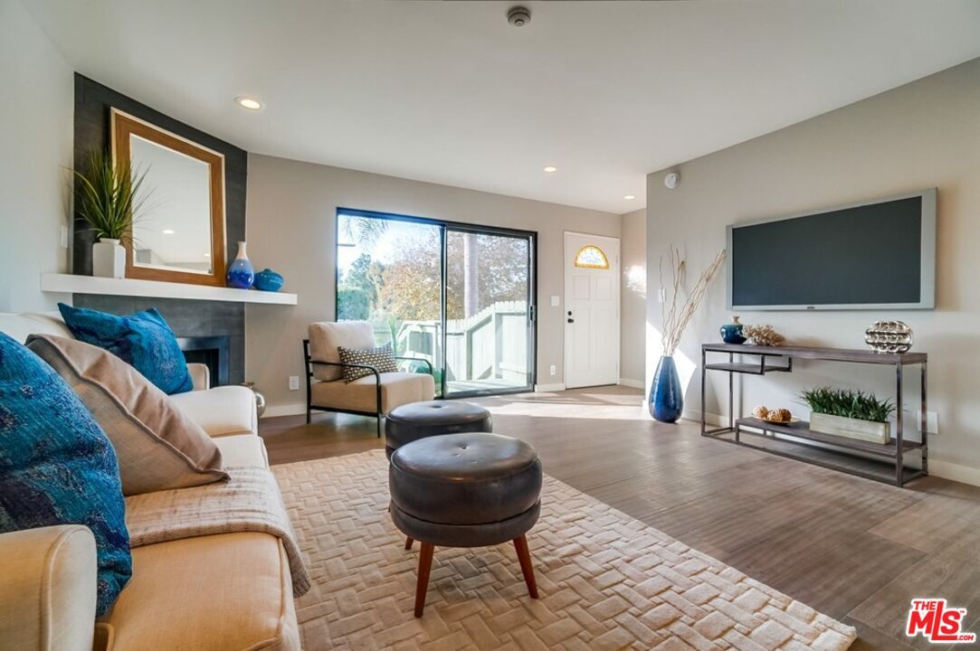 Fireplace, Interior, Living room, Recessed Lighting, Wood Texture Flooring