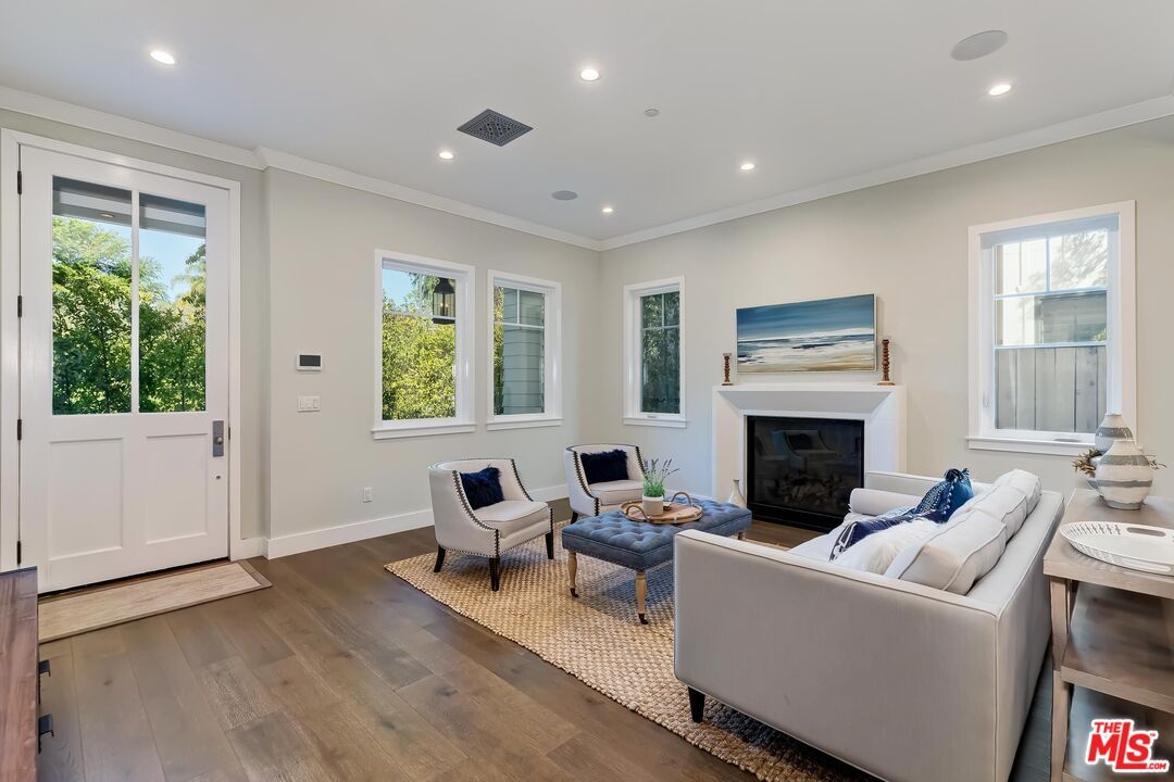 Fireplace, Interior, Living room, Recessed Lighting, Wood Texture Flooring