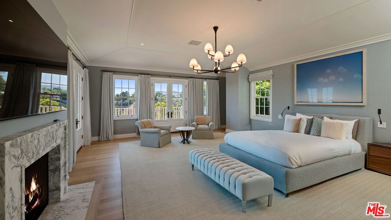 Bedroom, Chandelier, Fireplace, Interior, Recessed Lighting, Wood Texture Flooring