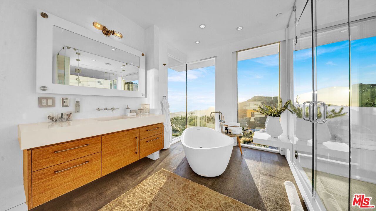 Bathroom, Dual Sink Vanities, Free Standing Baths, Glass Shower, Interior, Recessed Lighting, Wood Texture Flooring