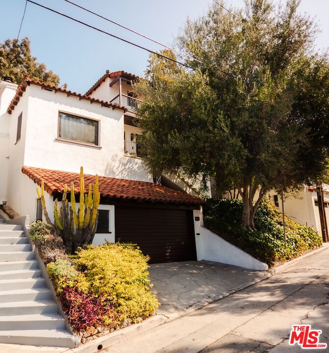 Attached, Exterior, Facade, Spanish Mediterranean