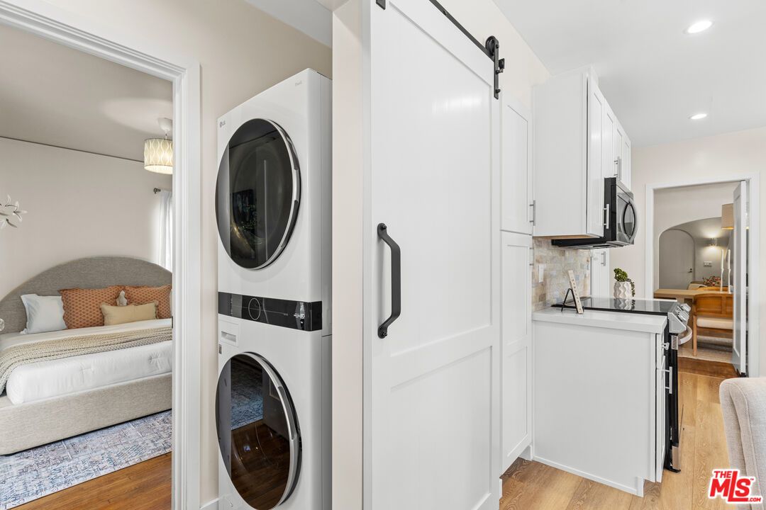 Bedroom, Interior, Recessed Lighting, Utility Closets, Washer, Wood Texture Flooring