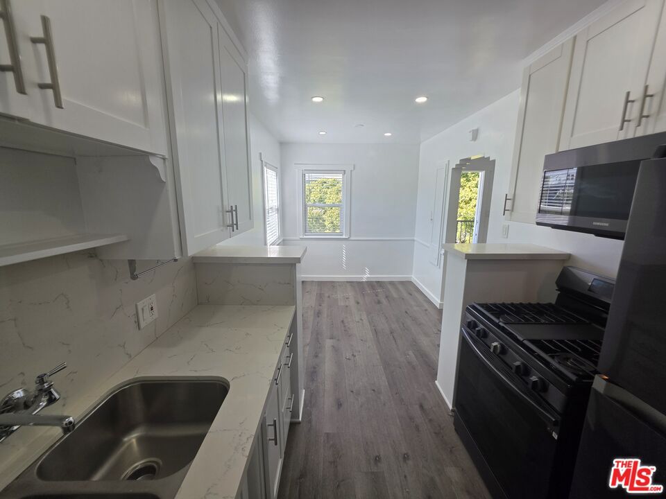 Interior, Kitchen, Marble Walls, Recessed Lighting, Wood Texture Flooring