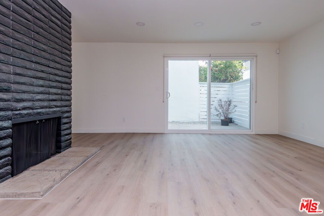 Empty room, Fireplace, Interior, Recessed Lighting, Wood Texture Flooring