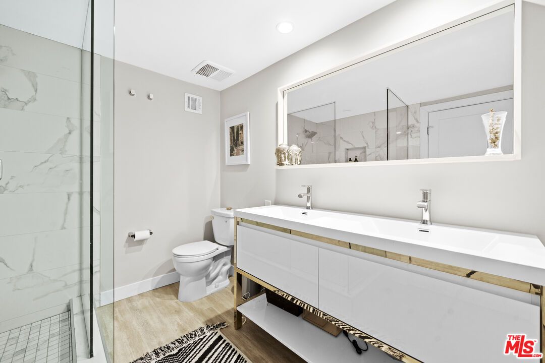 Bathroom, Glass Shower, Interior, Marble Walls, Recessed Lighting, Wood Texture Flooring