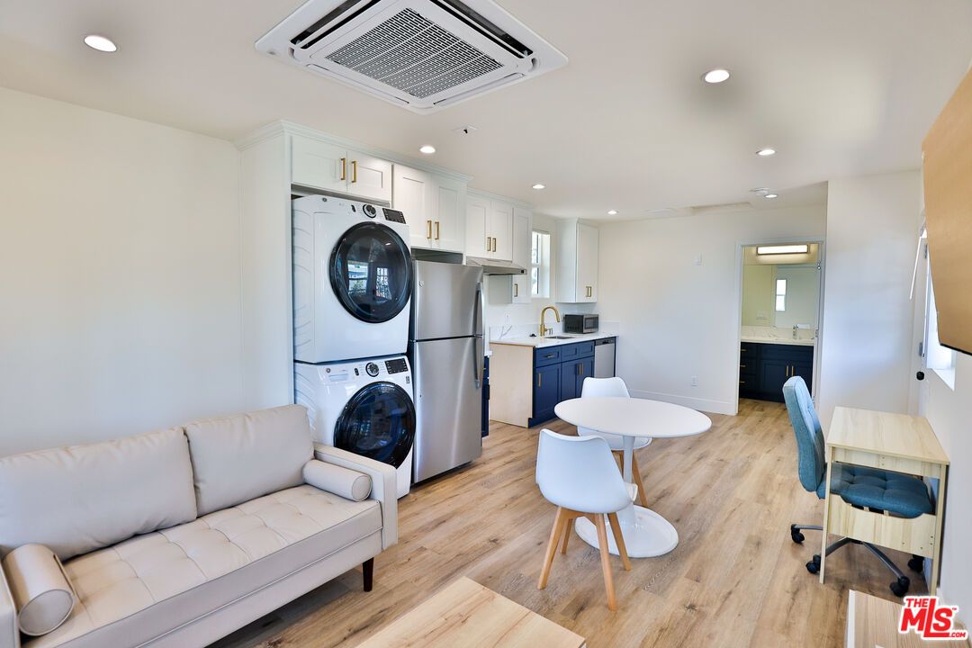 Interior, Kitchen, Recessed Lighting, Utility Closets, Washer, Wood Texture Flooring