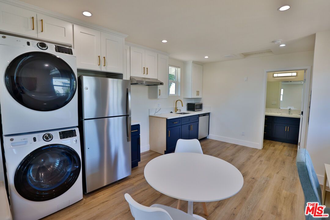 Interior, Kitchen, Recessed Lighting, Utility Closets, Washer, Wood Texture Flooring