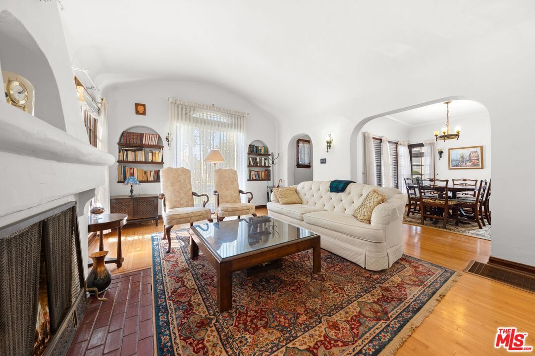 Chandelier, Dining room, Fireplace, Interior, Living room, Wood Texture Flooring
