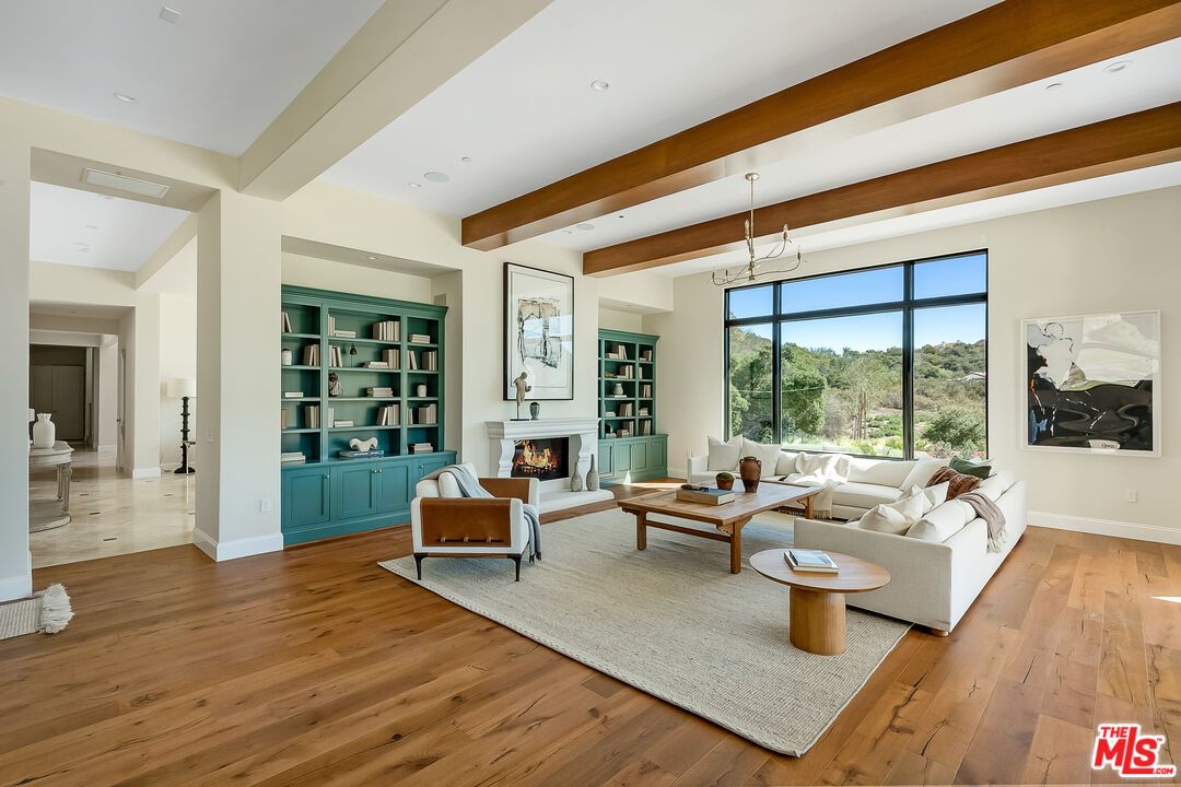 Fireplace, Interior, Living room, Pendant Lights, Recessed Lighting, Wooden Beams, Wood Texture Flooring