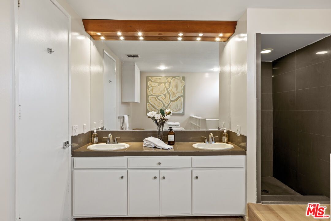 Bathroom, Dual Sink Vanities, Interior, Recessed Lighting, Wood Texture Flooring