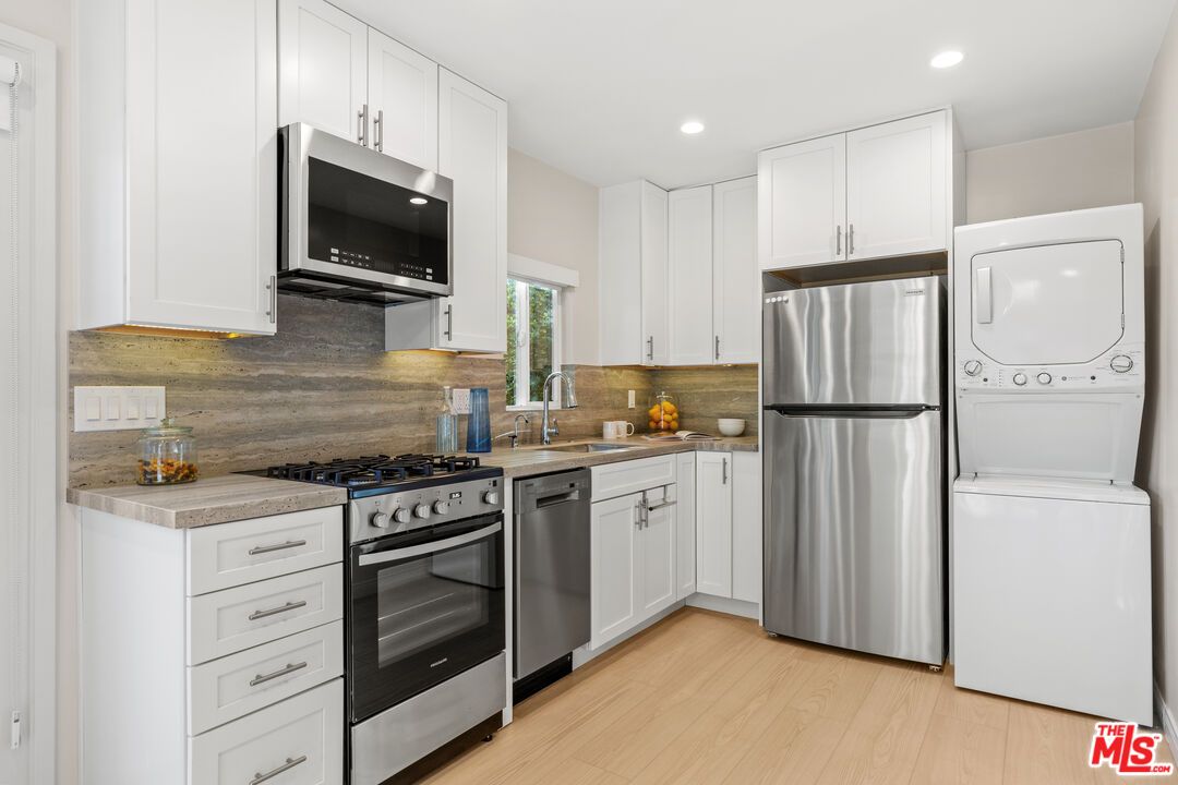 Interior, Kitchen, Recessed Lighting, Stainless Steel Appliances, Washer, Wood Texture Flooring