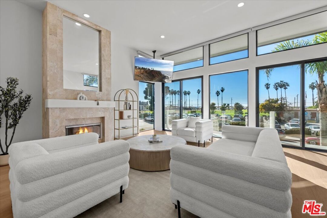 Fireplace, Interior, Living room, Recessed Lighting, Water, Wood Texture Flooring