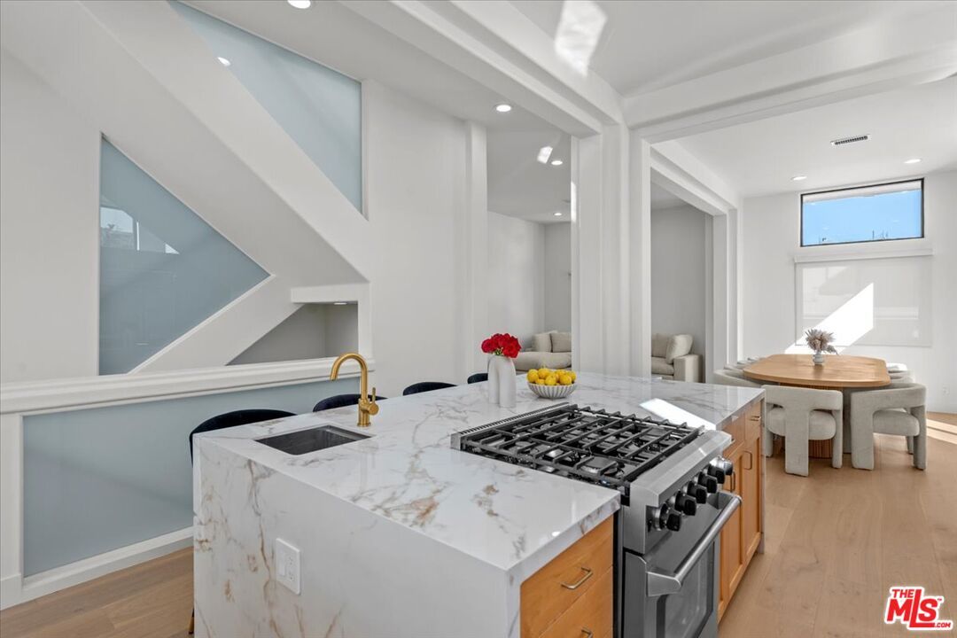 Dining room, Interior, Kitchen, Recessed Lighting, Stainless Steel Appliances, Wood Texture Flooring