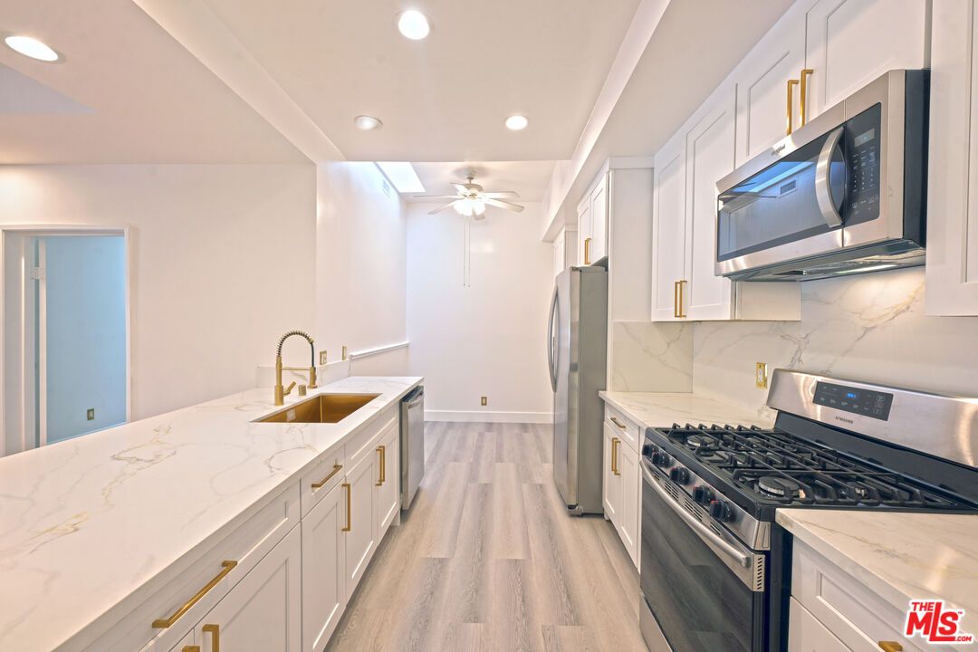 Interior, Kitchen, Marble Walls, Recessed Lighting, Wood Texture Flooring