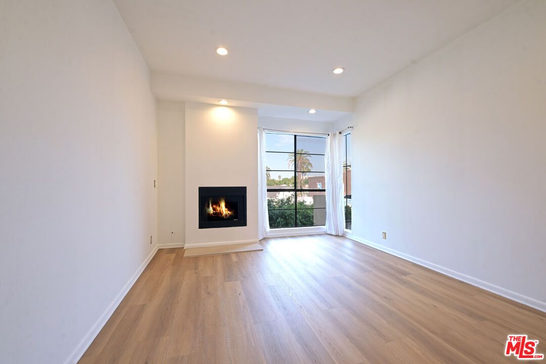 Empty room, Fireplace, Interior, Recessed Lighting, Wood Texture Flooring