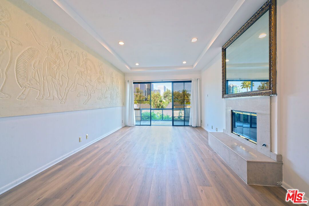 Empty room, Fireplace, Interior, Recessed Lighting, Wood Texture Flooring