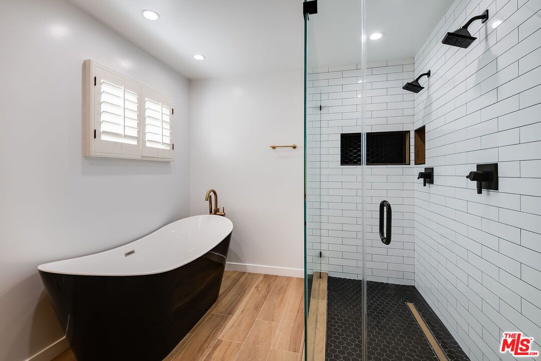 Bathroom, Free Standing Baths, Glass Shower, Interior, Recessed Lighting, Wood Texture Flooring