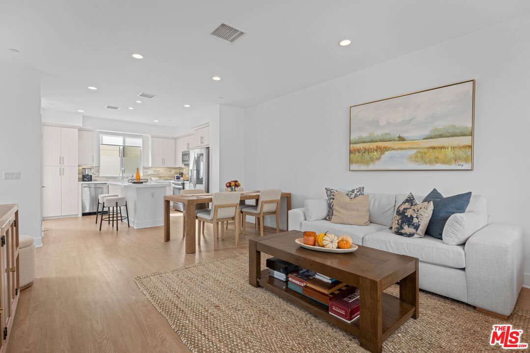 Dining room, Interior, Kitchen, Living room, Recessed Lighting, Stainless Steel Appliances, Wood Texture Flooring