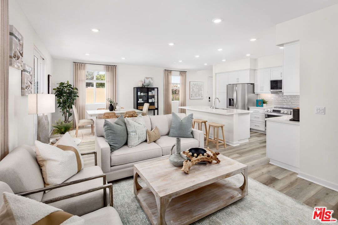 Dining room, Interior, Kitchen, Living room, Recessed Lighting, Stainless Steel Appliances, Wood Texture Flooring