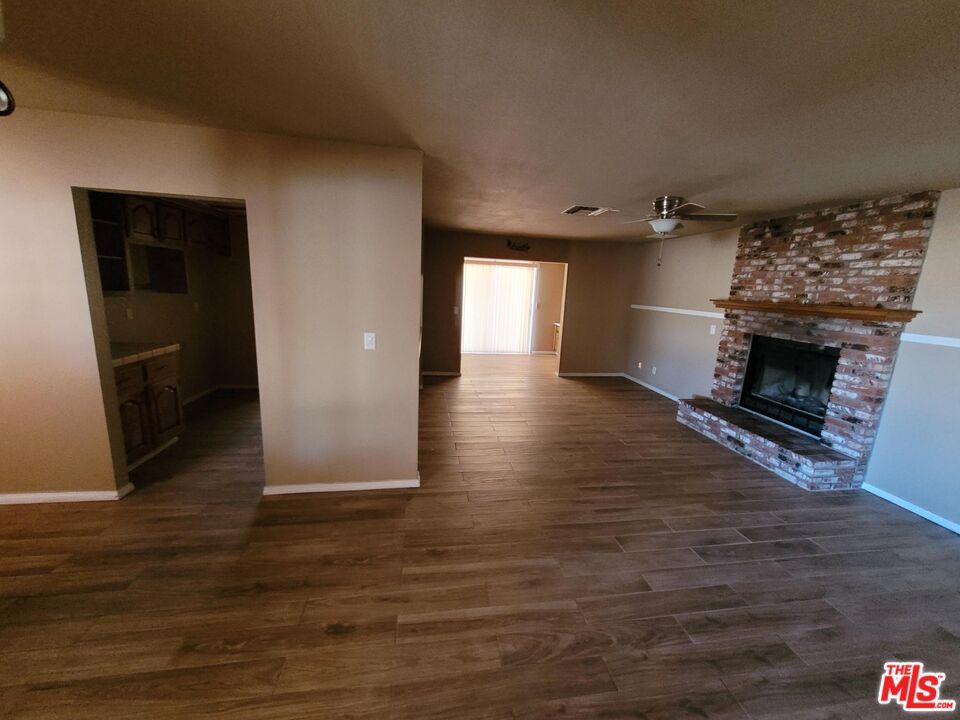 Empty room, Fireplace, Interior, Stone Walls, Wood Texture Flooring
