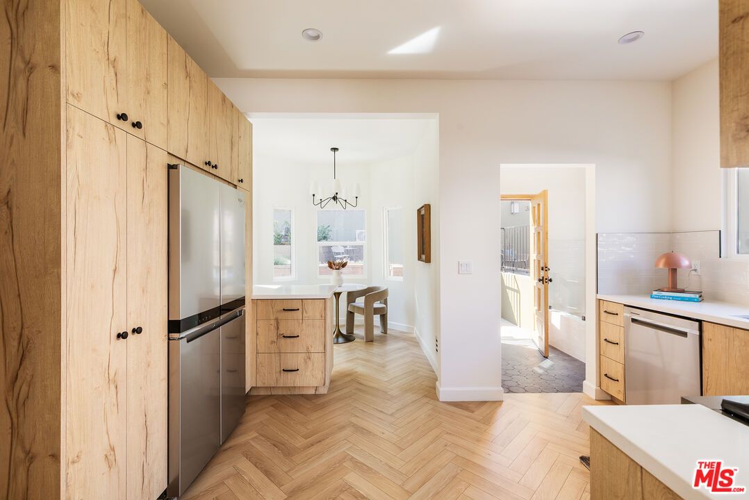 Dining room, Interior, Kitchen, Pendant Lights, Recessed Lighting, Stainless Steel Appliances, Wood Texture Flooring