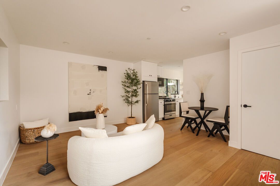 Dining room, Interior, Kitchen, Recessed Lighting, Stainless Steel Appliances, Wood Texture Flooring