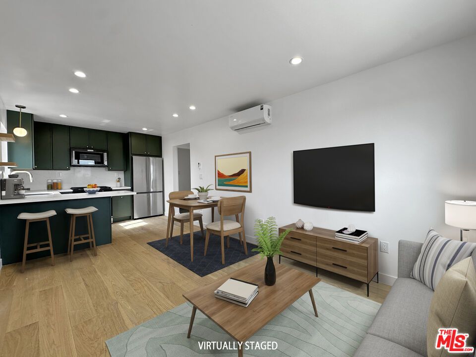 Dining room, Interior, Kitchen, Living room, Pendant Lights, Recessed Lighting, Stainless Steel Appliances, Wood Texture Flooring