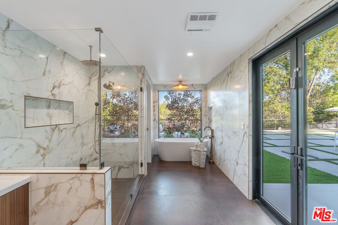 Bathroom, Free Standing Baths, Glass Shower, Interior, Marble Walls, Recessed Lighting