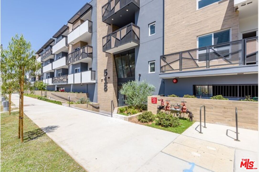 Exterior, Facade, Brick Facade, Condo Building