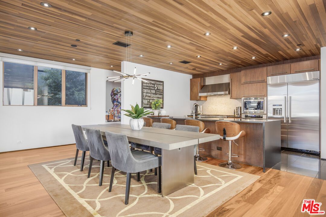 Dining room, Interior, Kitchen, Pendant Lights, Recessed Lighting, Stainless Steel Appliances, Wooden Ceilings, Wood Texture Flooring