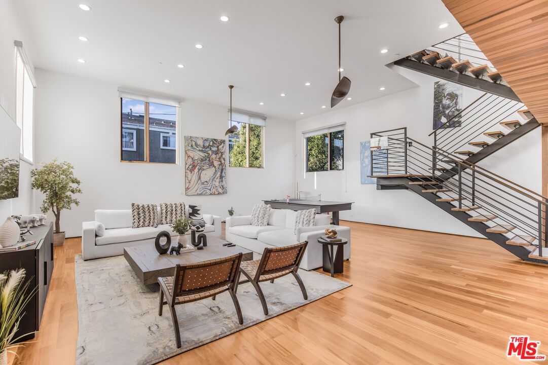 Billiard Table, Game Room, Interior, Living room, Pendant Lights, Recessed Lighting, Wood Texture Flooring