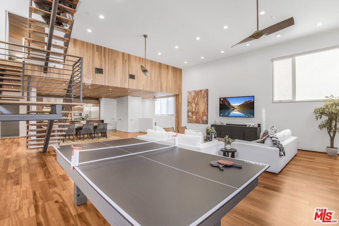Dining room, Game Room, Interior, Pendant Lights, Recessed Lighting, Wood Texture Flooring, Wooden Walls