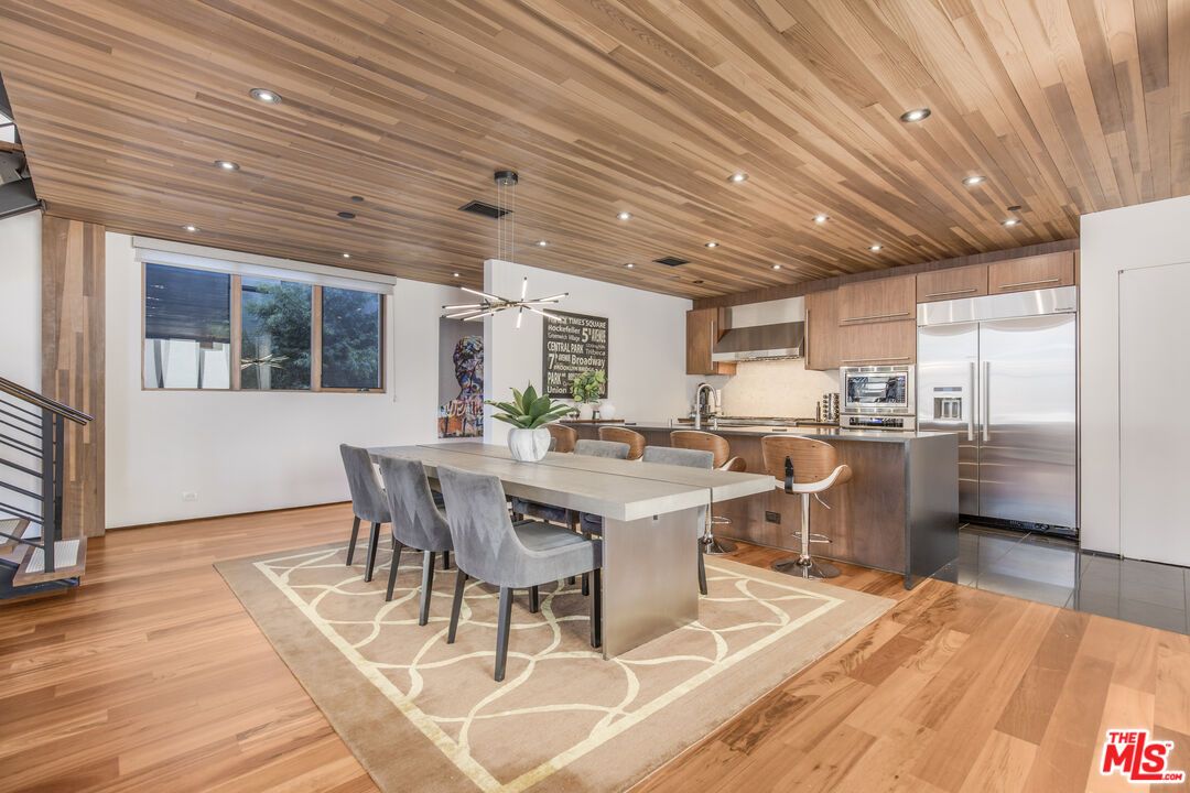 Dining room, Interior, Kitchen, Pendant Lights, Recessed Lighting, Stainless Steel Appliances, Wooden Ceilings, Wood Texture Flooring