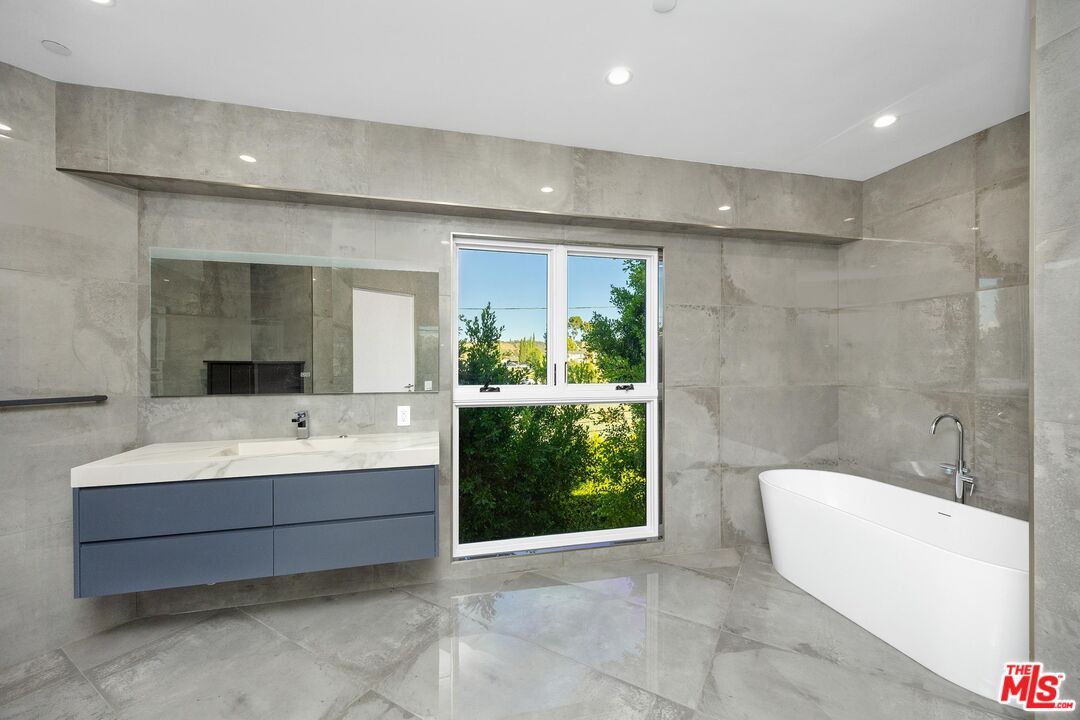 Bathroom, Dual Sink Vanities, Free Standing Baths, Interior, Marble, Marble Walls, Recessed Lighting