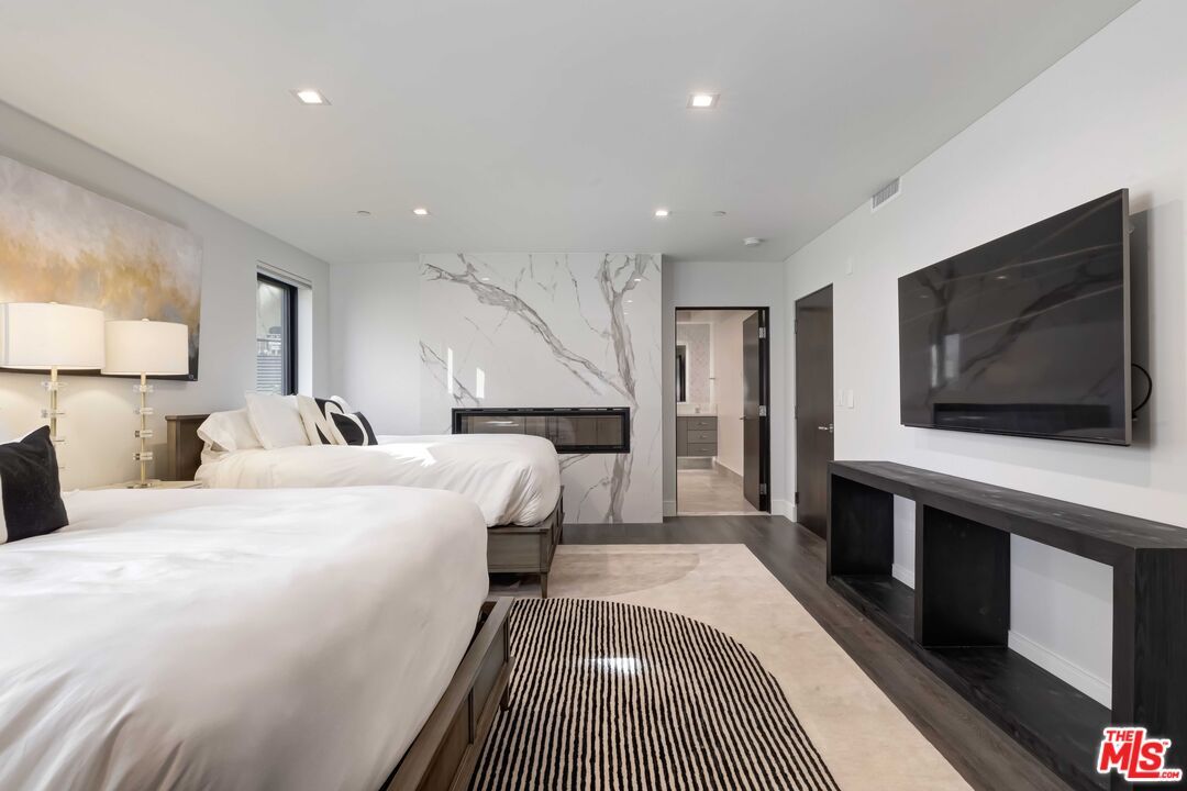 Bedroom, Fireplace, Interior, Marble Walls, Recessed Lighting, Wood Texture Flooring